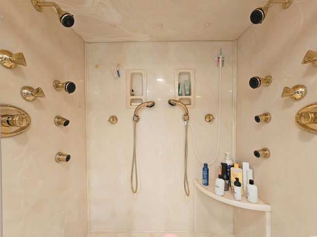 Full bathroom featuring a marble finish shower | Image 27