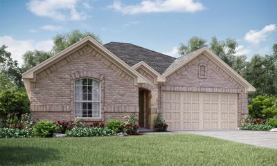 View of front of property with a front yard and a garage | Image 1