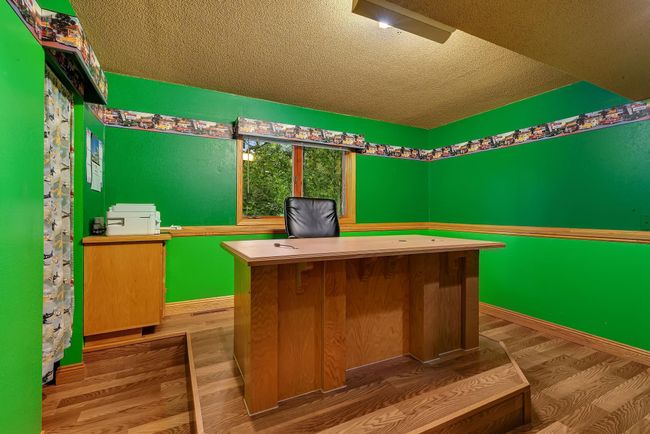 Lower level bedroom currently used as home office | Image 31