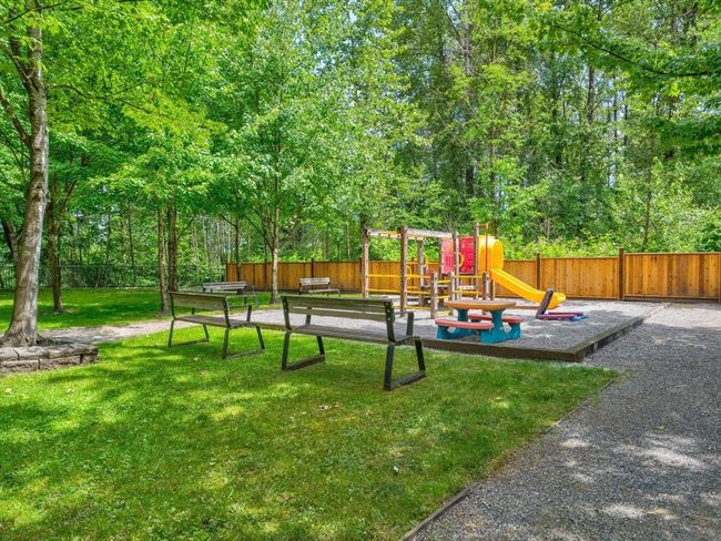 View of yard with a playground | Image 19