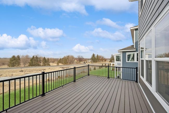The oversized deck is off the kitchen. | Image 35