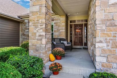 Lovely Front Porch Provides Just Enough Privacy, Comfort & a Gentle Breeze All Day Long | Image 2