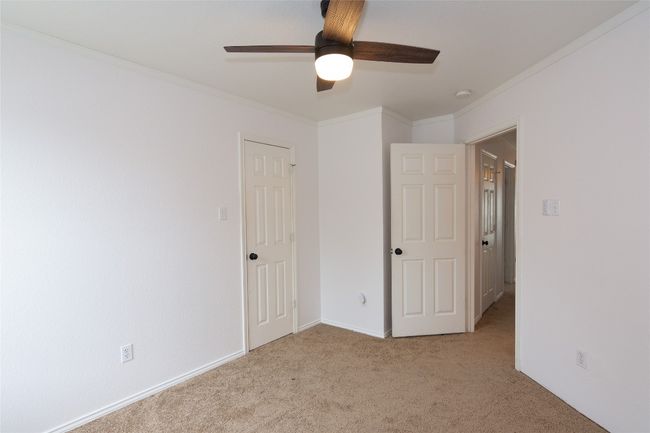 This bedroom includes a walk-in closet | Image 21