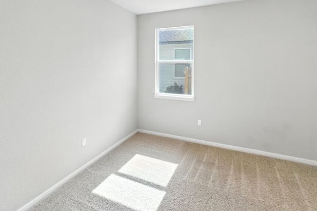 Carpeted spare room featuring baseboards | Image 19