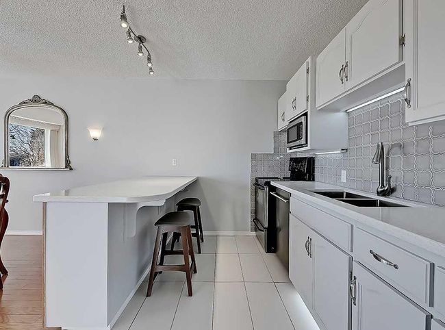 100 - 524 Cedar Crescent Sw, Condo with 2 bedrooms, 1 bathrooms and 1 parking in Calgary AB | Image 22