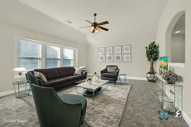 The spacious upper level provides a versatile second living area, ideal for hosting gatherings or creating the ultimate game room. | Image 18