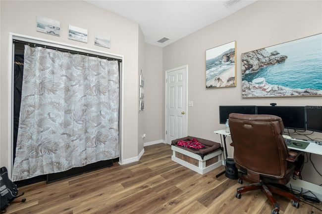 Vinyl Plank Flooring in guest bedrooms | Image 38