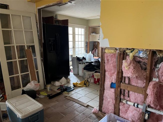 Some sheetrock is still missing. The house is packed with stuff that you can use or donate or throw away. | Image 21