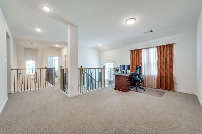 Office area with light carpet and recessed lighting | Image 18