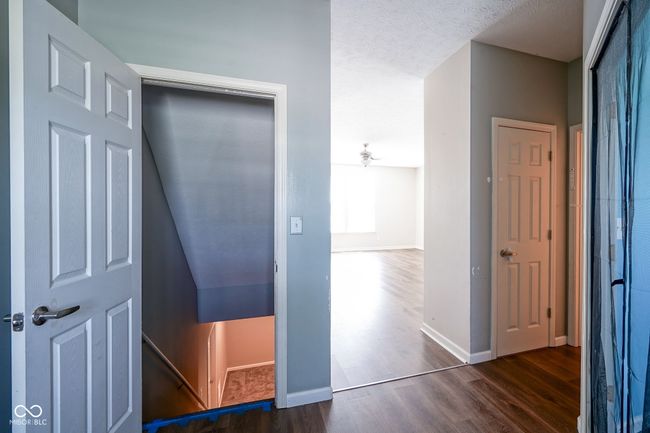 Entryway to basement and living room | Image 7