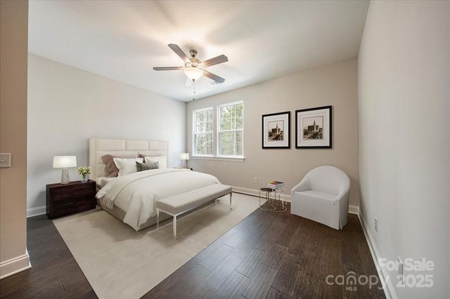 Large second guest bedroom on upper level with an oversized bathroom and walk-in closet. Virtually staged | Image 24