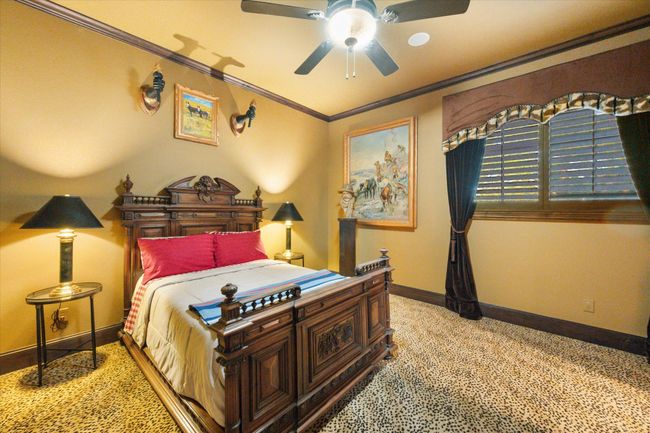 Bedroom featuring baseboards, crown molding | Image 29