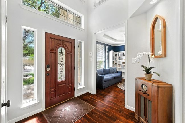 Foyer with plenty of natural light and dark wood-style floors | Image 12
