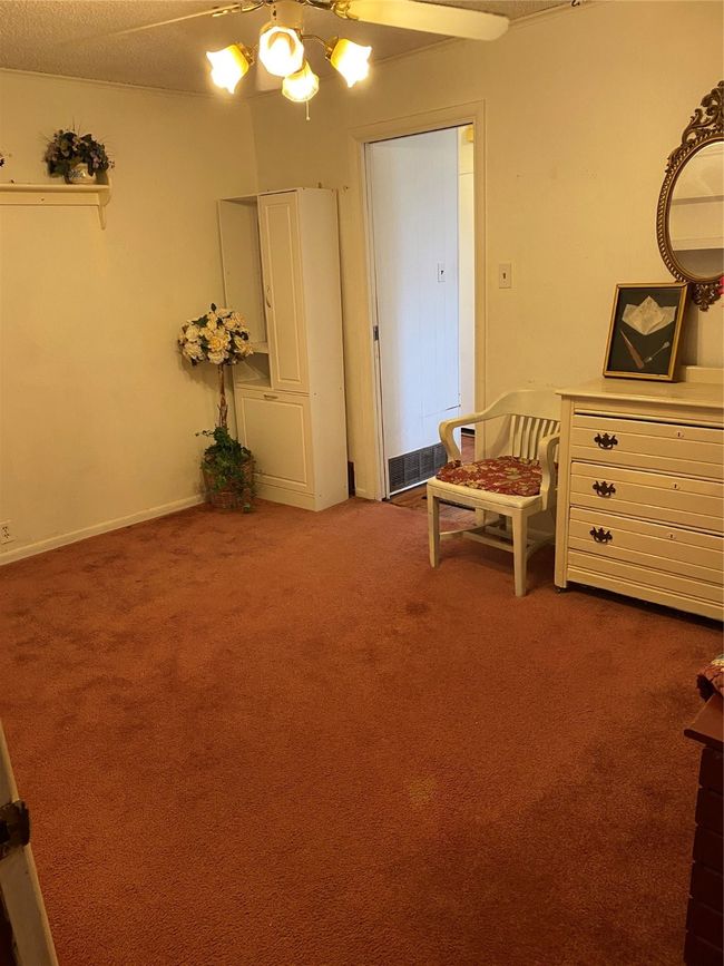 Sitting room featuring carpet flooring | Image 19