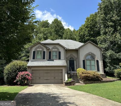 5730 Paces Place, House other with 4 bedrooms, 3 bathrooms and 6 parking in Suwanee GA | Image 1