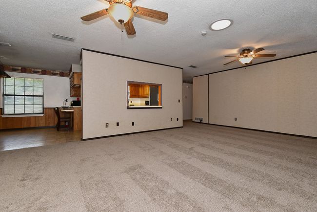 Living area to kitchen | Image 13