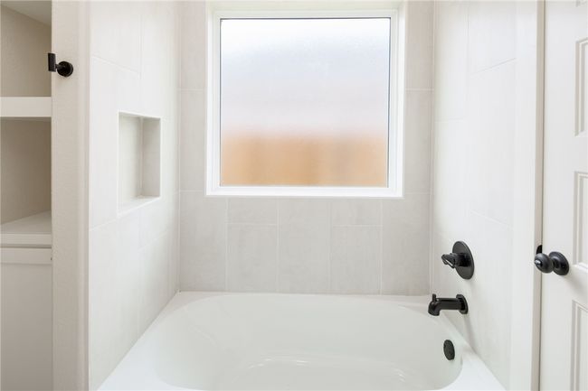 Bathroom with shower / bathtub combination | Image 26