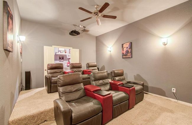 Custom stadium seating with enough space for comfortable reclining movie seats. | Image 26