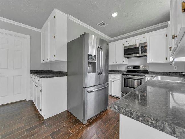 27015 Coach Light Ln, House other with 3 bedrooms, 2 bathrooms and null parking in New Caney TX | Image 10