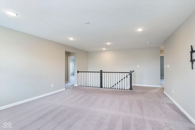 This is a non-virtually staged image of the loft area. | Image 30