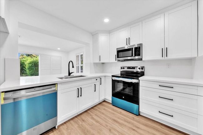 Newly Renovated with White Shaker Cabinets, Quartz Countertops & Stainless Steel Appliances | Image 7