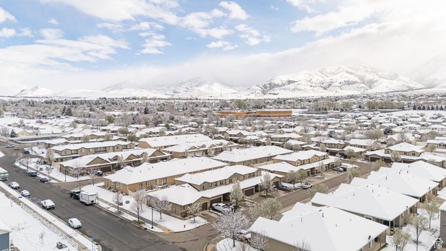 Snowy aerial view with a residential view and a mountain view | Image 22