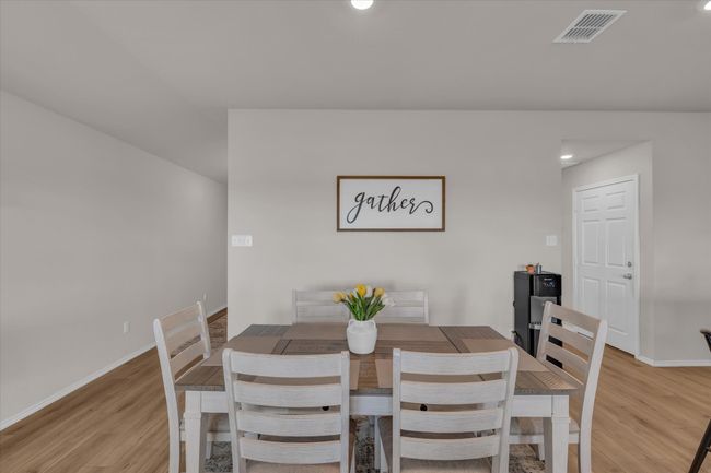 Dining space featuring light wood-type flooring, baseboards, and recessed lighting | Image 16