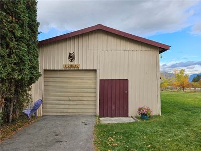 Pole barn with garage door. | Image 3