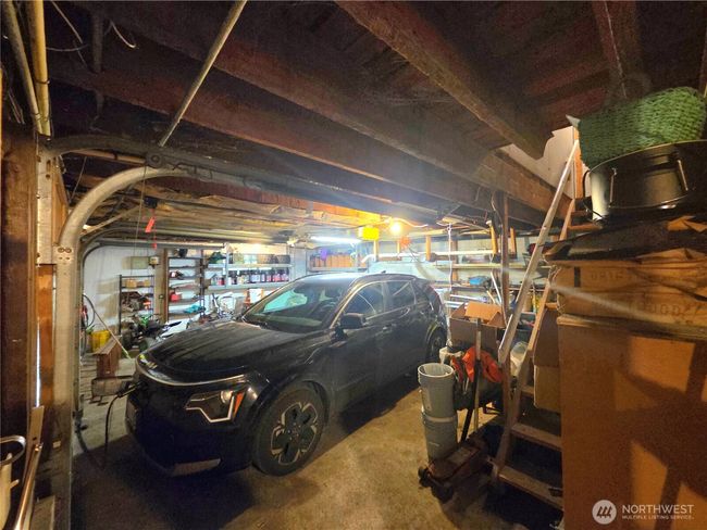 double car garage w/work space and under stair storage. Huge pantry at top of stairs | Image 26