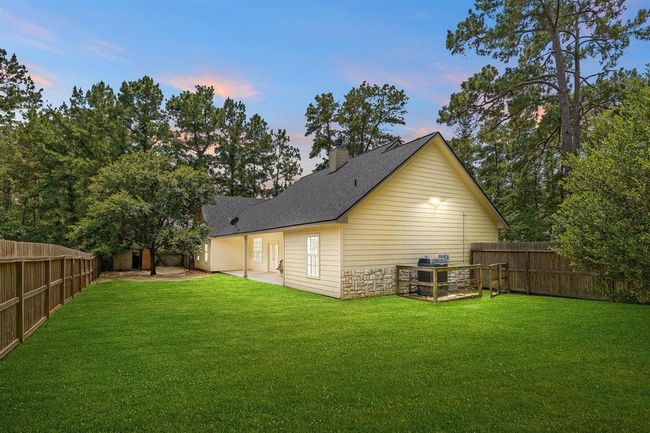 Your view of the backyard in the evening | Image 35
