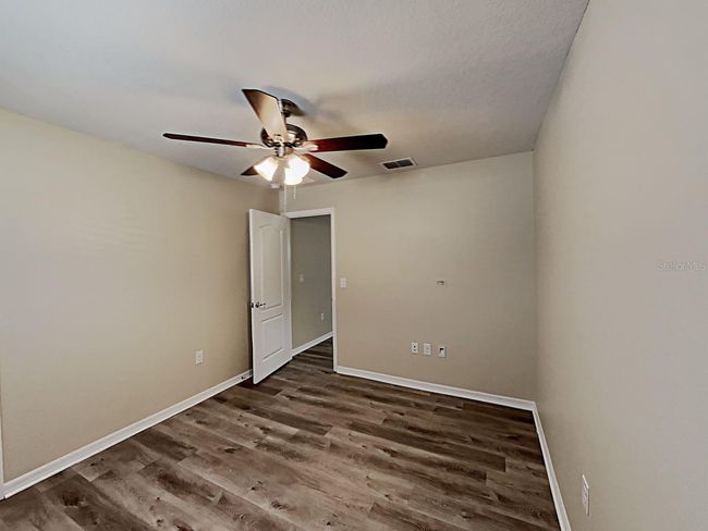 7603 Pool Compass Loop, House other with 4 bedrooms, 3 bathrooms and null parking in Wesley Chapel FL | Image 11