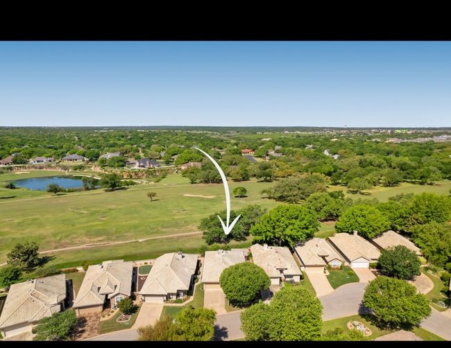 Birds eye view of property with a water view and a residential view | Image 18