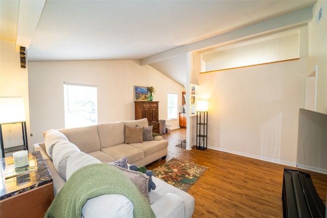 Living room featuring and baseboards | Image 9