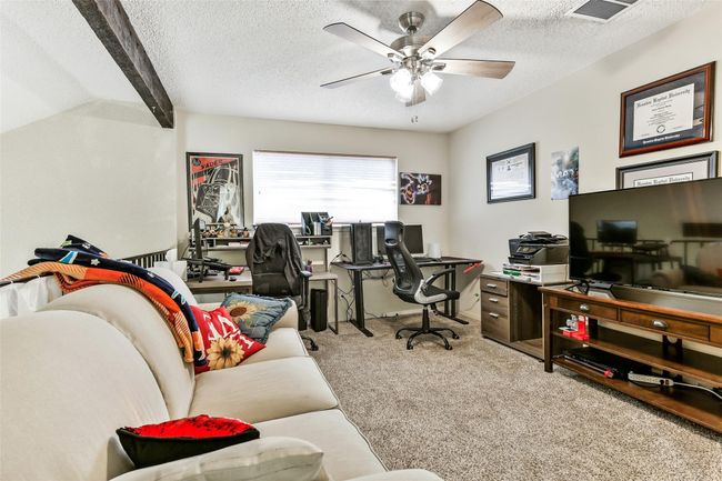 Many uses for this space: game room/loft or home office. Perfect for comfortable living. | Image 24