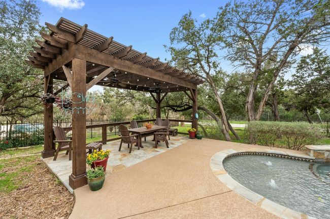Added space for seating under the pergola, has lights and a fan! | Image 38
