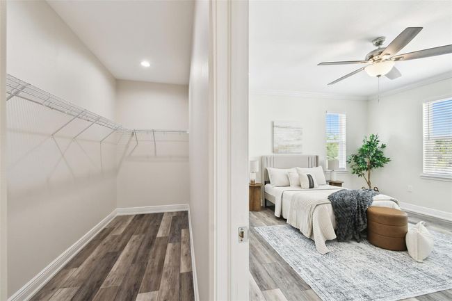 Massive walk-in primary closet | Image 19