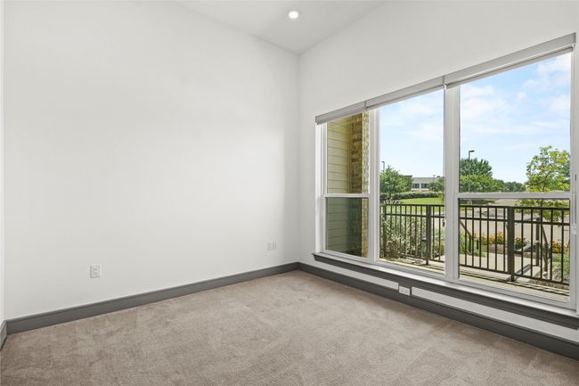 Carpeted spare room featuring baseboards and recessed lighting | Image 15