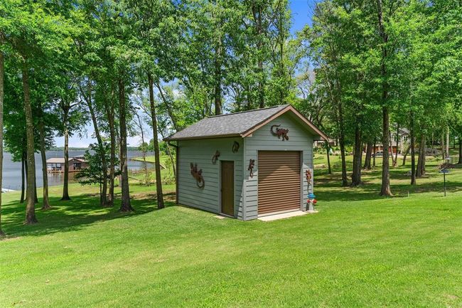 View of shed / structure featuring a yard | Image 30