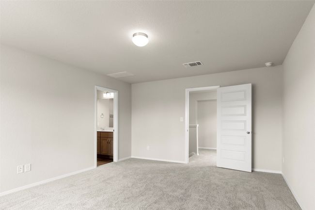 Unfurnished bedroom with carpet floors and ensuite bath | Image 25