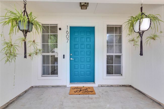 Entrance to property featuring covered porch | Image 4