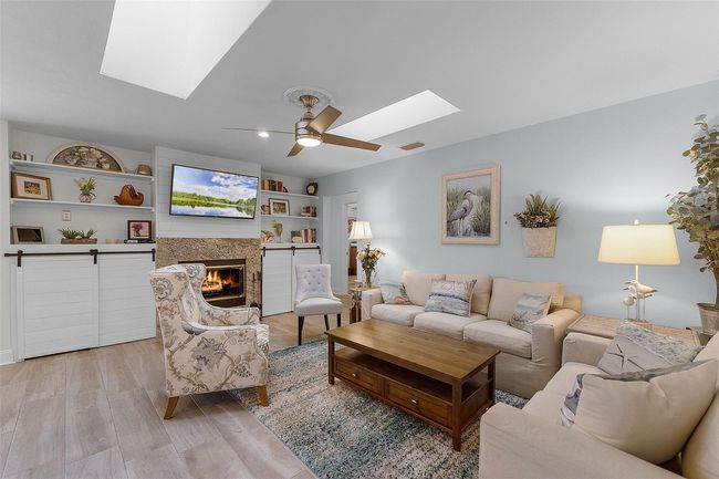 Family Room includes custom built -in's with ample storage. What a relaxing vibe!!! | Image 10