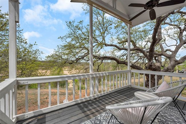 Wooden deck featuring a ceiling fan | Image 27