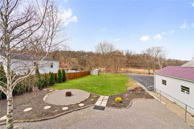 Beautifully landscaped back yard w a fence! | Image 8