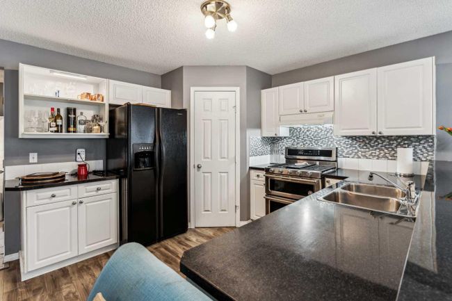 48 Hidden Creek Rise Nw, Home with 3 bedrooms, 2 bathrooms and 2 parking in Calgary AB | Image 10
