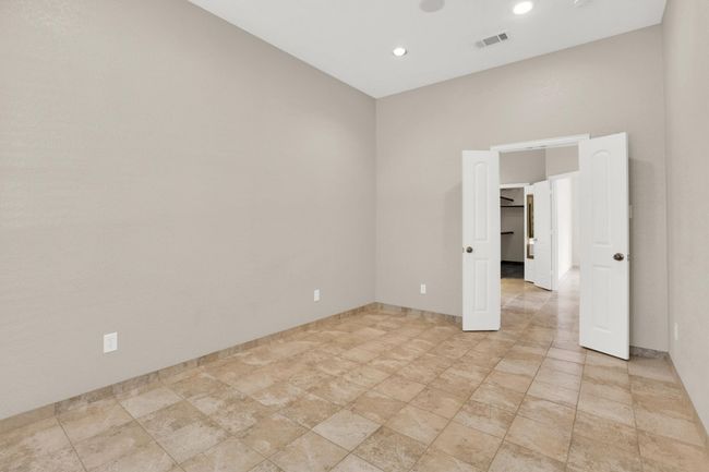 Empty room featuring baseboards, visible vents, and recessed lighting | Image 34