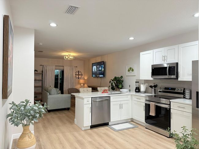12223 Kirk Ave, Home with 6 bedrooms, 4 bathrooms and null parking in Port Charlotte FL | Image 9