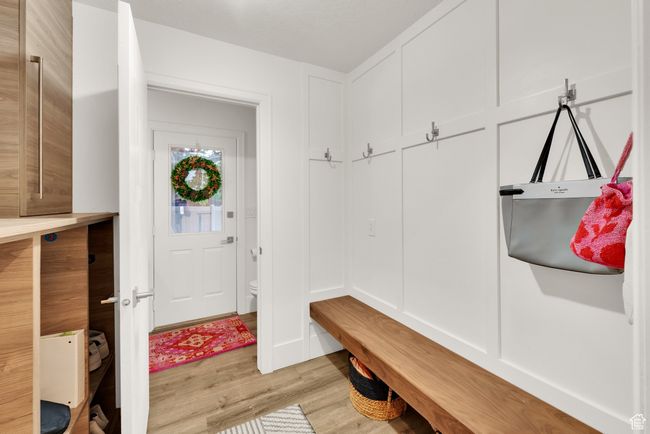 Mudroom with light wood-style floors | Image 23