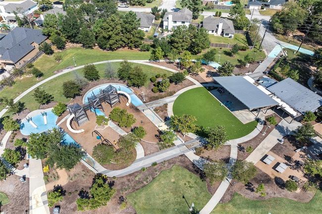 a nice park and splash area, trails, a basket ball court | Image 49
