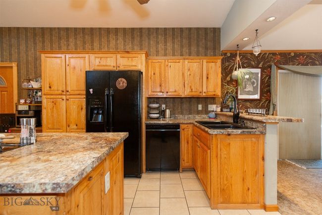 Refrigerator, Dishwasher, Sink, and Breakfast Bar | Image 4