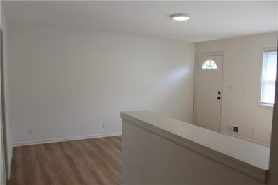 Entryway with wood-type flooring | Image 3